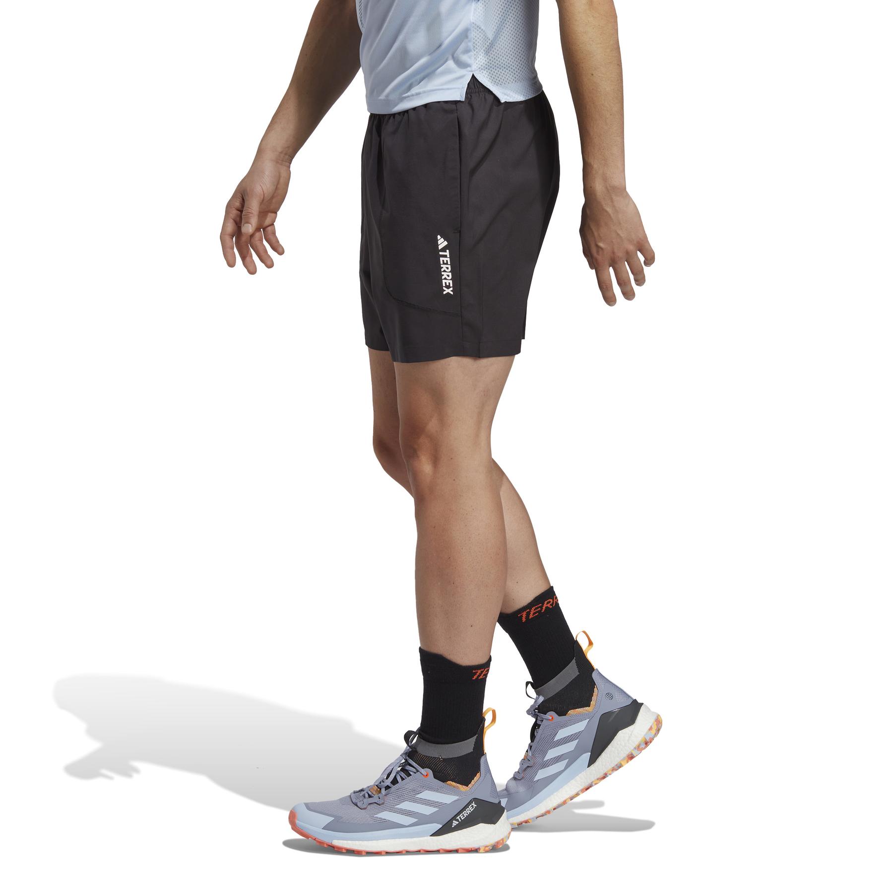 product/a/d/adidas_hm4013_5_apparel_on_model_side_view_white-nw032724.jpg