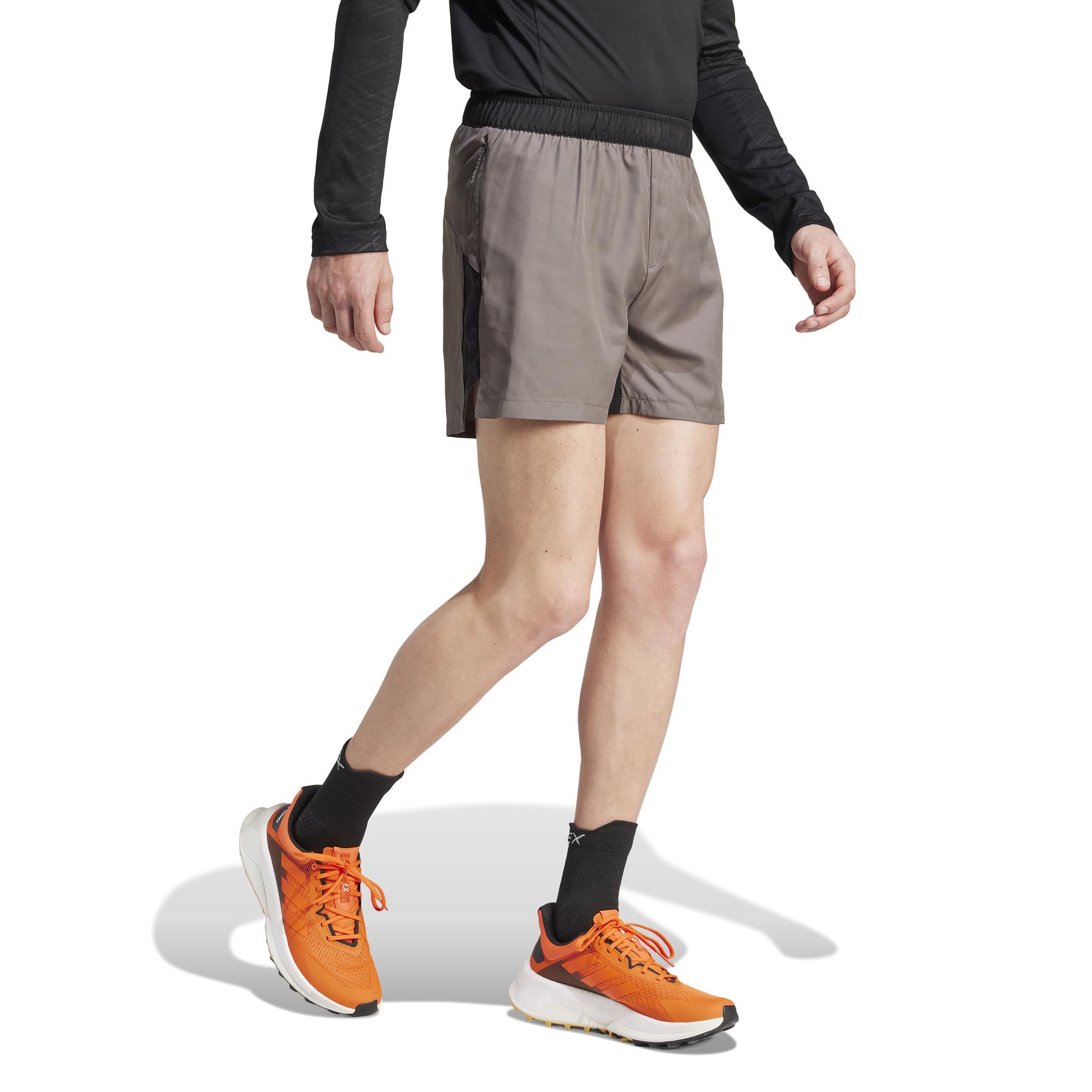 product/a/d/adidas_it7913_5_apparel_on_model_walking_view_white.jpg