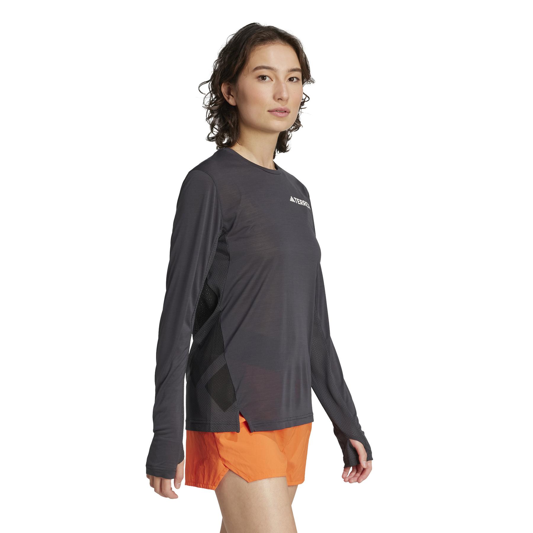 product/a/d/adidas_jl6341_4_apparel_on_model_walking_view_white.jpg