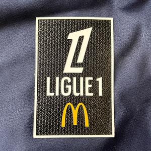 marking-003119-badge-ligue-1-2024-noir-blanc-jaune